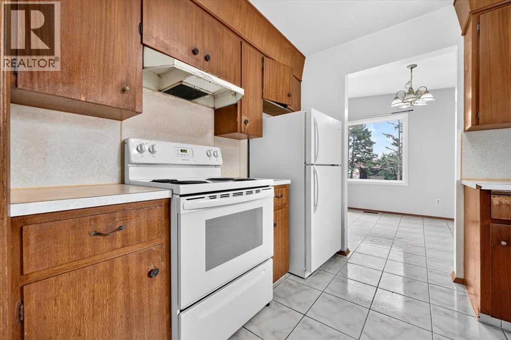 6325 Tregillus Street NW, Calgary, Alberta  T2K 3T4 - Photo 9 - A2342985