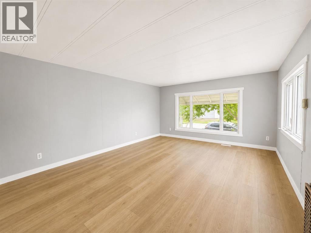 168 Huntwell Road Ne, Calgary, Alberta  t2k 5s9 - Photo 5 - A2335838