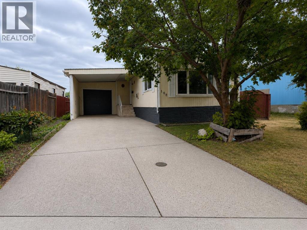 168 Huntwell Road Ne, Calgary, Alberta  t2k 5s9 - Photo 2 - A2335838