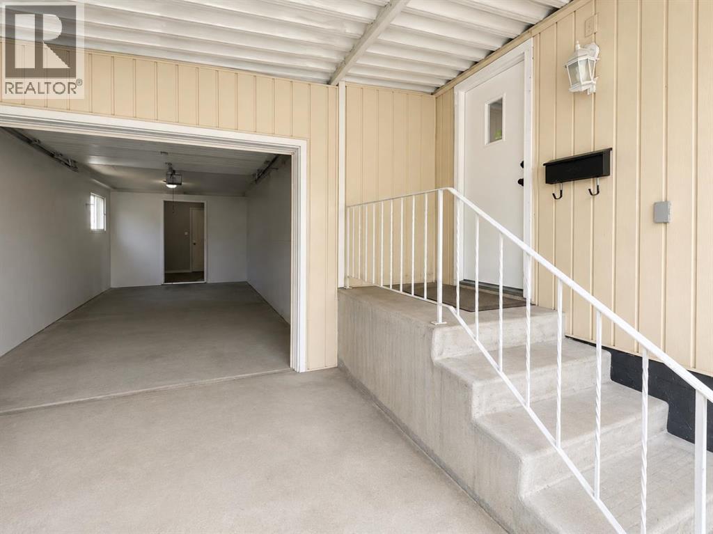168 Huntwell Road Ne, Calgary, Alberta  t2k 5s9 - Photo 3 - A2335838