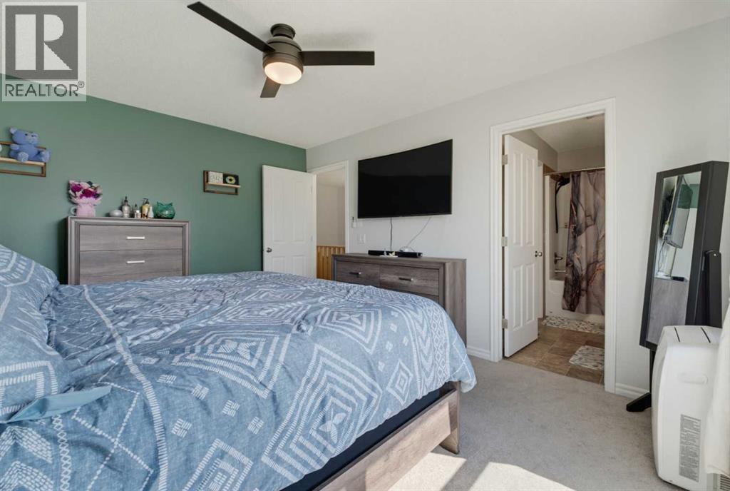 917 Prairie Springs Drive SW, Airdrie, Alberta  T4B 0E9 - Photo 24 - A2340372