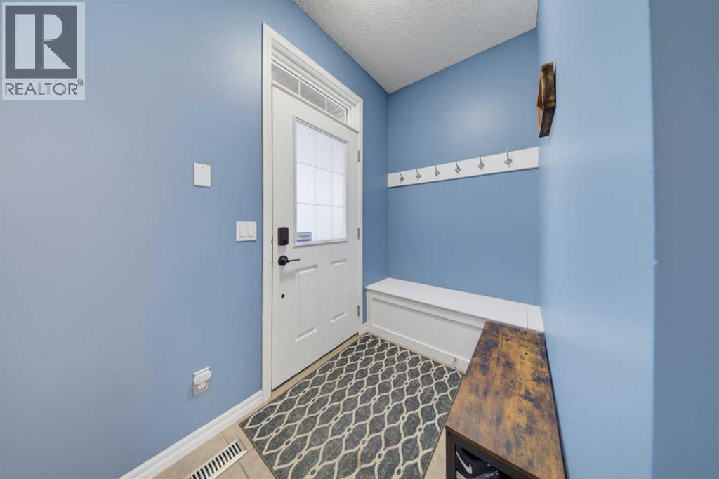 917 Prairie Springs Drive SW, Airdrie, Alberta  T4B 0E9 - Photo 6 - A2340372