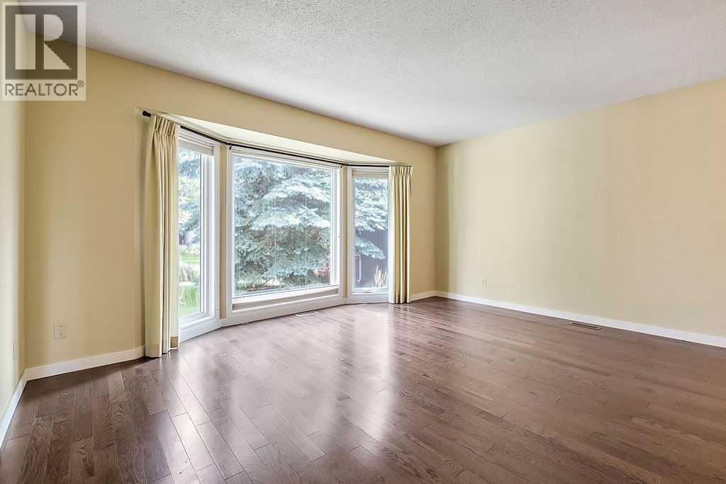 55 Suntree Lane, Okotoks, Alberta  T1S 1C1 - Photo 6 - A2342487