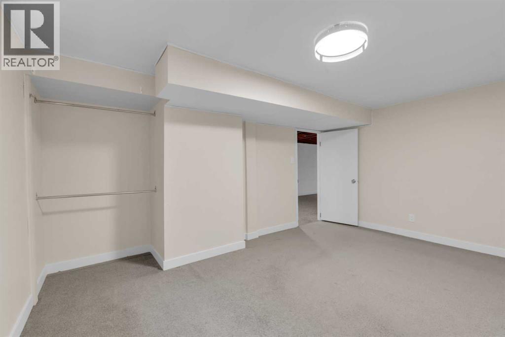 30 Hutton Place Sw, Calgary, Alberta  T2V 3B6 - Photo 23 - A2336909
