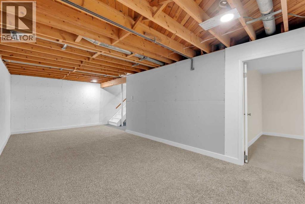 30 Hutton Place Sw, Calgary, Alberta  T2V 3B6 - Photo 26 - A2336909