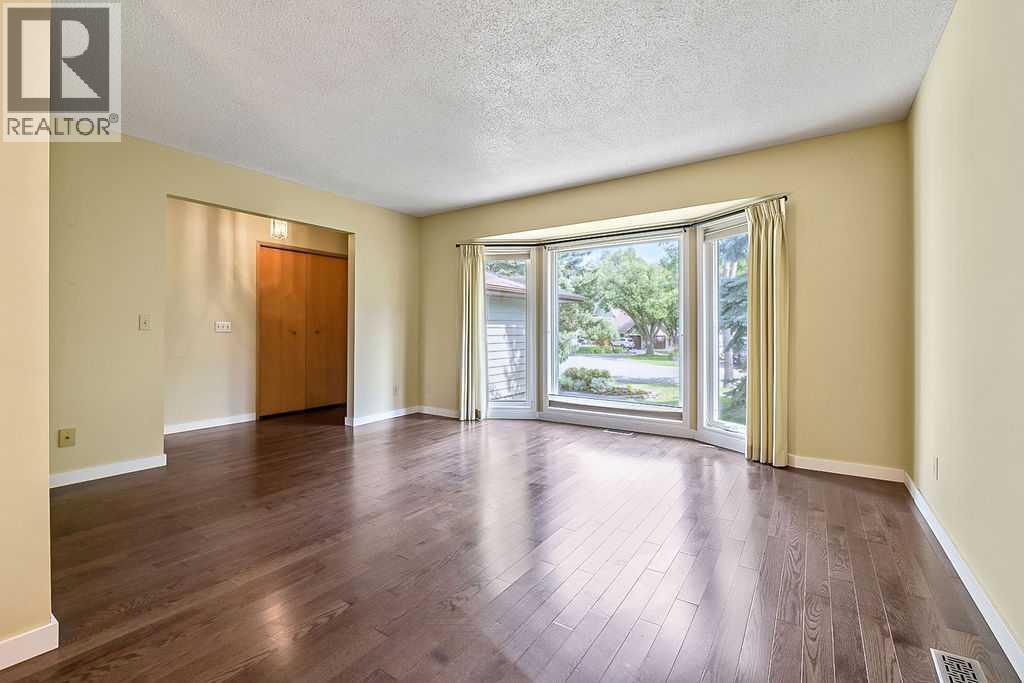 55 Suntree Lane, Okotoks, Alberta  T1S 1C1 - Photo 7 - A2342487