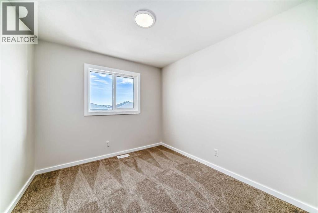 104 Creekside Rise SW, Calgary, Alberta  T2X 6G8 - Photo 30 - A2326343