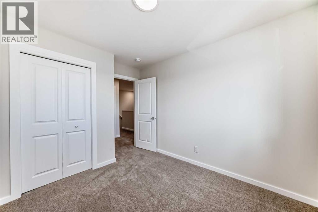 104 Creekside Rise SW, Calgary, Alberta  T2X 6G8 - Photo 31 - A2326343
