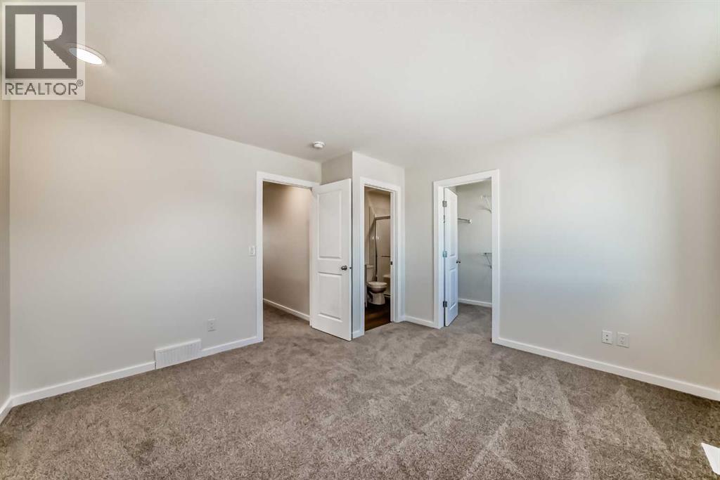 104 Creekside Rise SW, Calgary, Alberta  T2X 6G8 - Photo 25 - A2326343