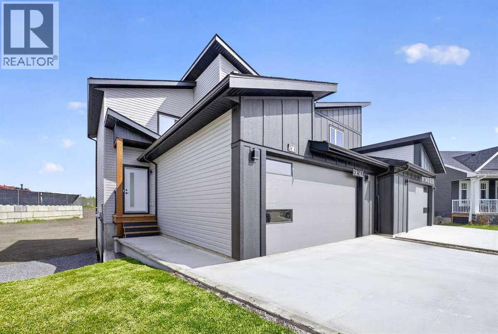 26b Poplar Ridge Close, Didsbury, Alberta  T0M 0W0 - Photo 1 - A2315488