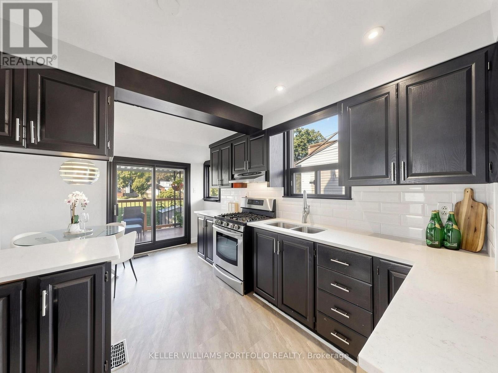 48 Hiltz Avenue, Toronto, Ontario M4L 2N5 - Photo 17 - E13751906