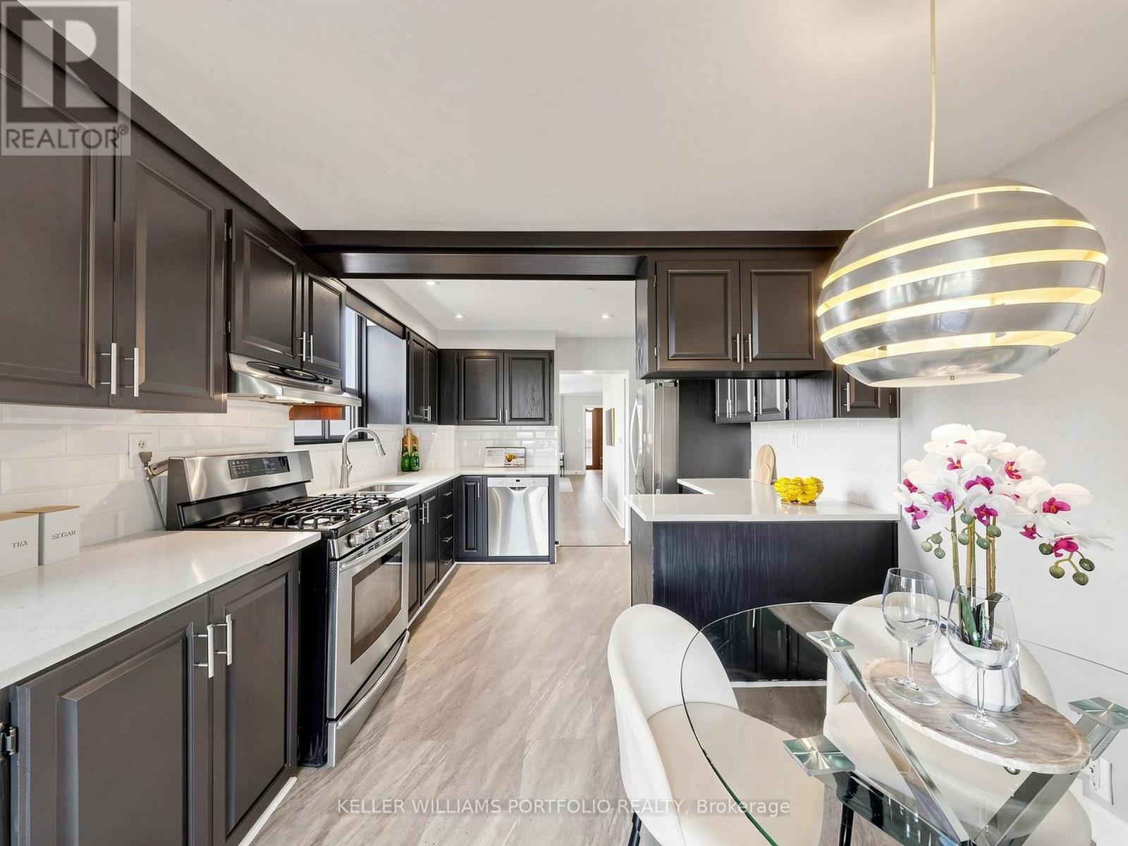 48 Hiltz Avenue, Toronto, Ontario M4L 2N5 - Photo 24 - E13751906