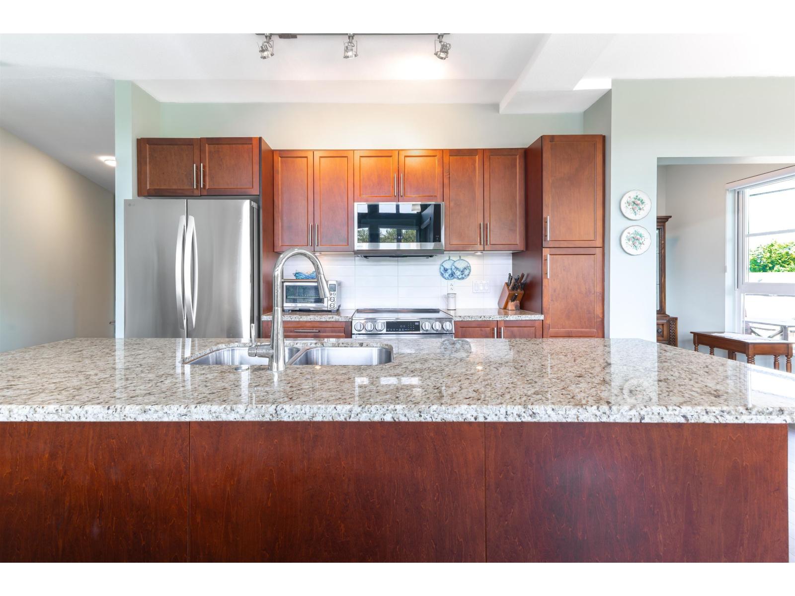 416 23215 Billy Brown Road, Langley, British Columbia  V1M 0B7 - Photo 11 - R3161612