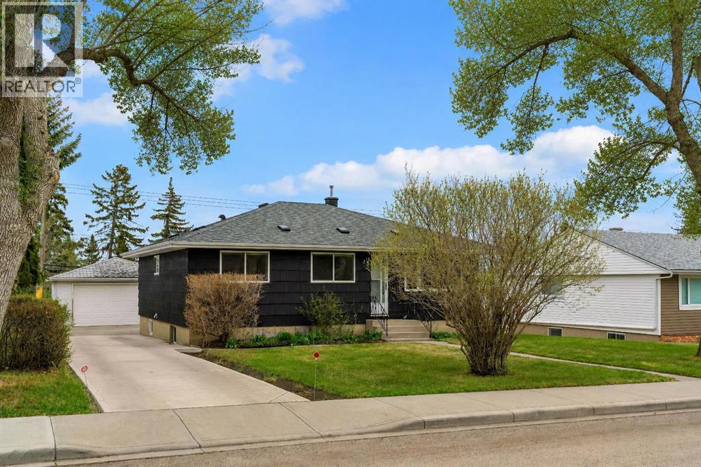 254 Hendon Drive Nw, Calgary, Alberta  T2K 1Z5 - Photo 3 - A2338635