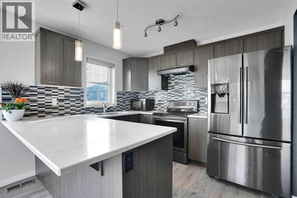 220 Windford Crescent, Airdrie, Alberta  T4B 4G5 - Photo 6 - A2341248