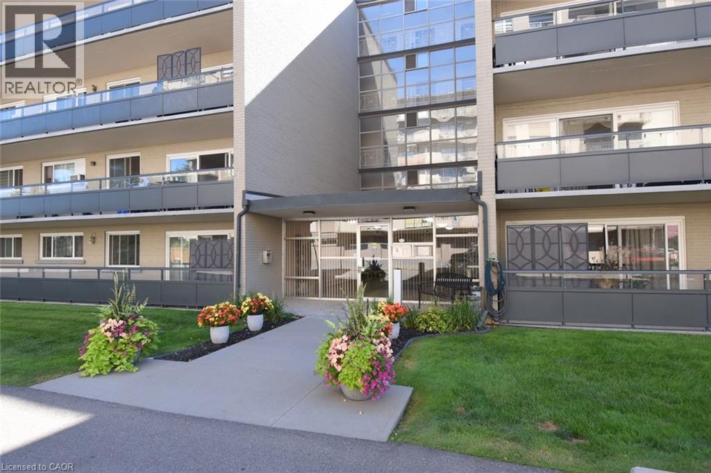 510 Queenston Road Unit# 406, Hamilton, Ontario  L8K 1J3 - Photo 2 - 40860552