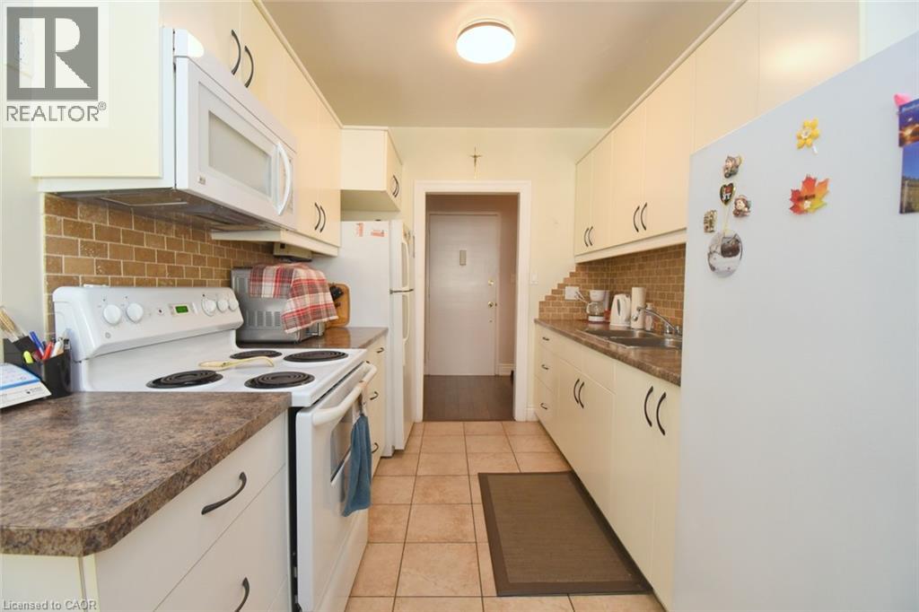 510 Queenston Road Unit# 406, Hamilton, Ontario  L8K 1J3 - Photo 14 - 40860552