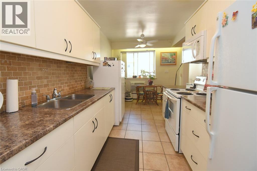 510 Queenston Road Unit# 406, Hamilton, Ontario  L8K 1J3 - Photo 15 - 40860552
