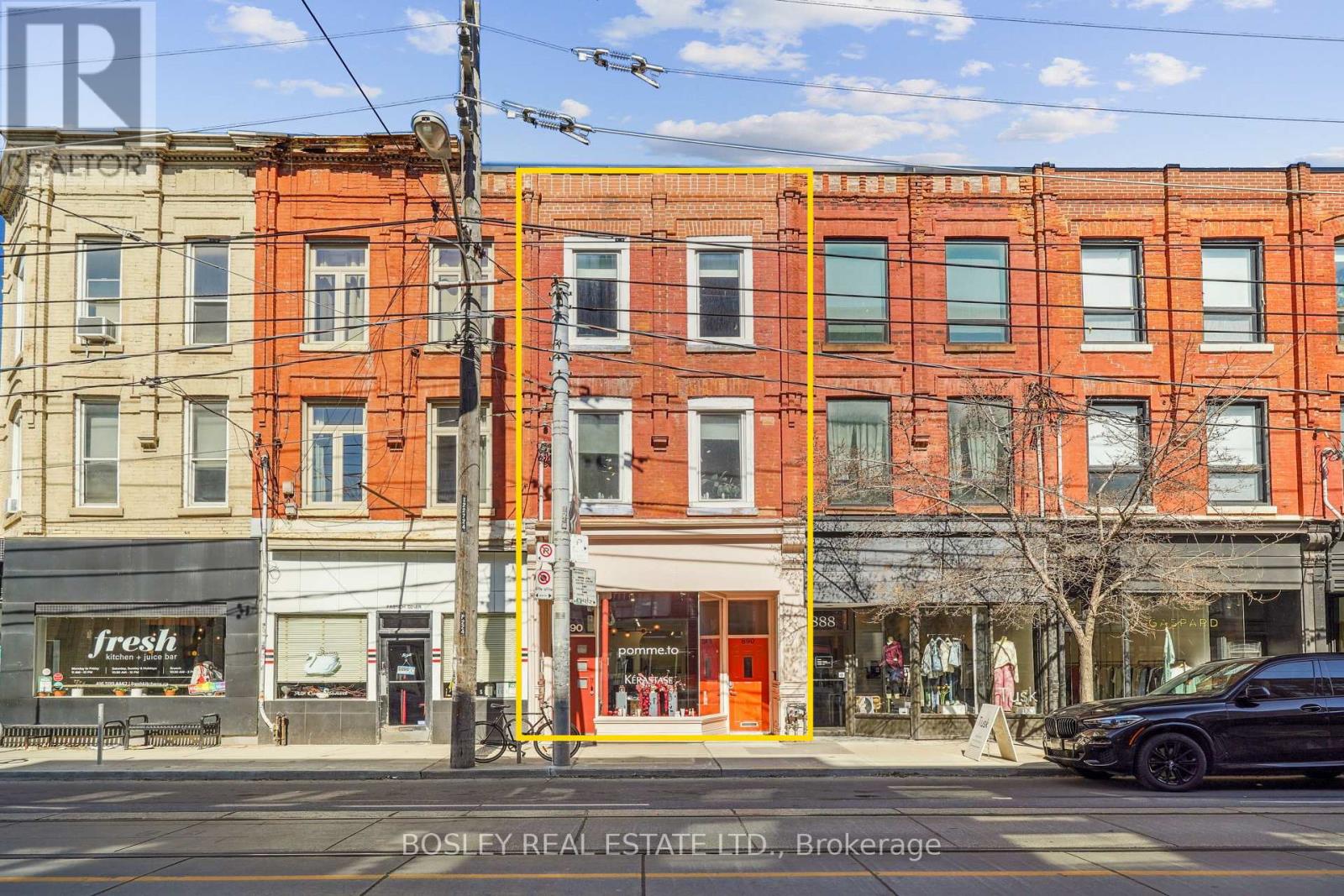 A two-storey, two-bedroom residence with a private rooftop terrace overlooking Trinity Bellwoods Park, paired with two commercial tenancies generating income against the holding costs. The residence sits above a 2019 steel-constructed, double-fire-rated building on Trinity Park Lane at the rear of the property. The interiors have a Scandinavian feel, while the private terrace offers unobstructed views over the park and CN Tower. The tenant is in the final year of the lease, with the residence becoming available for owner or investor occupancy as of July 31, 2027. The commercial income is included. The Queen Street frontage is a classic Toronto brownstone, occupied in its entirety by Pomme T.O, a L'Oreal/Kerastase flagship boutique. The rear building holds a commercial unit at grade, currently leased month-to-month, providing flexibility for its future use-whether maintained as income-producing commercial space, repositioned, or potentially converted to private parking/garage space, subject to approvals. Together, the two structures total approximately 4,200 sf and are interconnected on the first and second floors. Consider what the alternative buys. A condominium in this pocket delivers comparable living space, a monthly maintenance fee, no land and no income. Here, a private buyer owns the land and both buildings freehold, collects income across all three tenancies in the interim, and from July 2027 can take over the residence and its terrace overlooking the park while commercial rent continues to offset carrying costs. Positioned on Queen and Shaw among Aesop, Le Labo, Mother and Fable, this is a rare long-hold opportunity combining freehold ownership, income, flexible commercial use and an irreplaceable Trinity Bellwoods location. Also listed in the commercial category under MLS# C13756150. Please see that listing for additional detail. (id:48254)