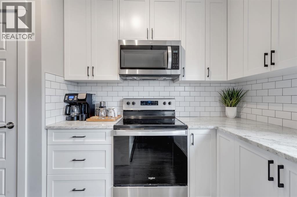 11 Sage Bluff Gate NW, Calgary, Alberta  T3R 1T5 - Photo 4 - A2332305