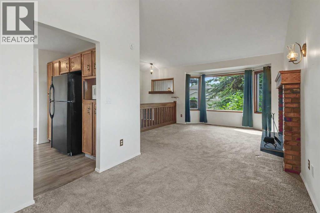 88 Woodfern Rise Sw, Calgary, Alberta  T2W 4S2 - Photo 7 - A2341482