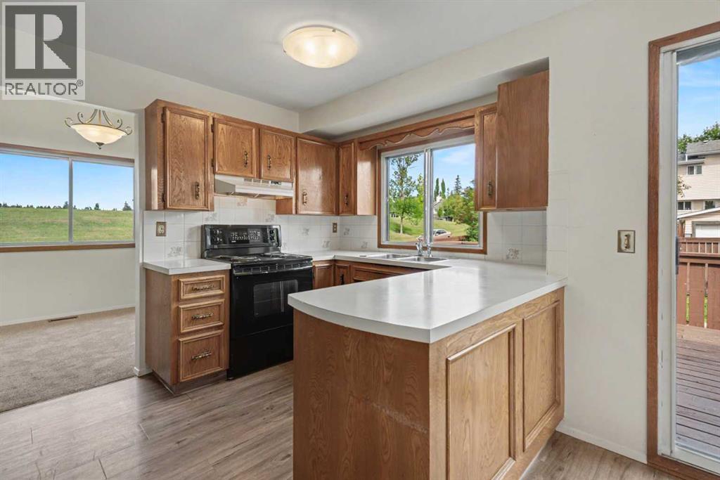88 Woodfern Rise Sw, Calgary, Alberta  T2W 4S2 - Photo 9 - A2341482