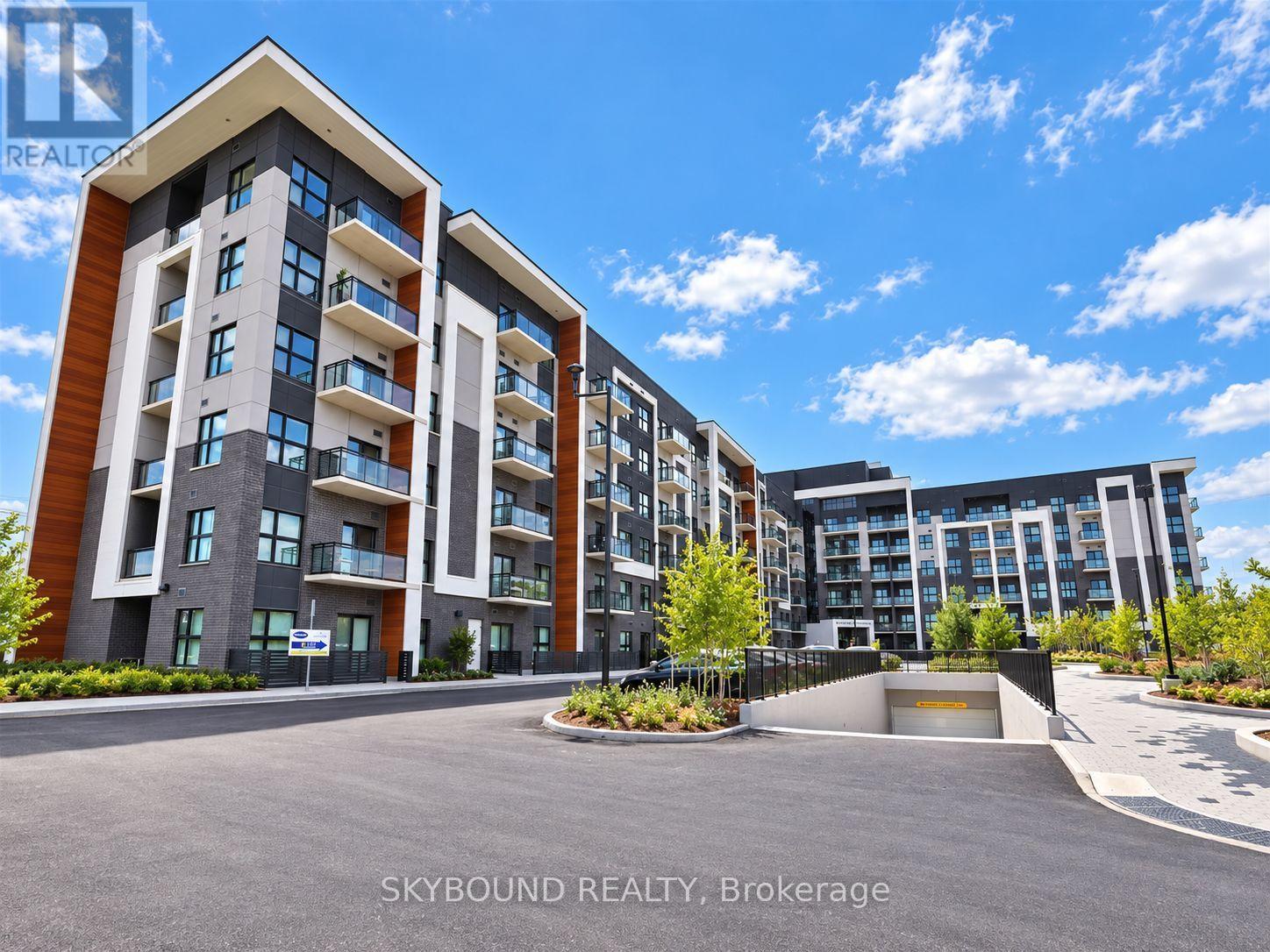 605 - 128 Grovewood Common, Oakville, Ontario  L6H 0X3 - Photo 1 - W13756616