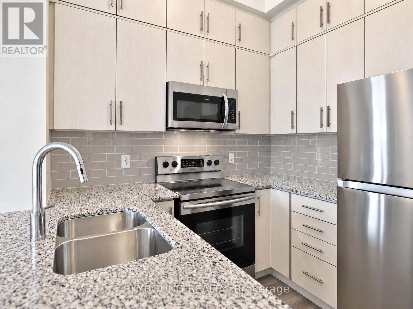 605 - 128 Grovewood Common, Oakville, Ontario  L6H 0X3 - Photo 5 - W13756616