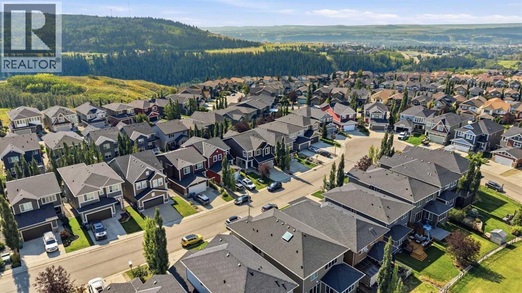 63 Sunset Park, Cochrane, Alberta  T4C 0N4 - Photo 32 - A2341342