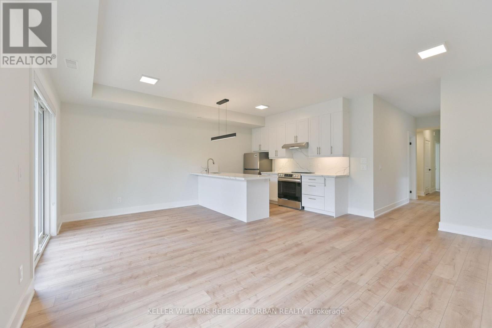 2 - 2420 Gerrard Street E, Toronto, Ontario  M4E 2E9 - Photo 11 - E13756836