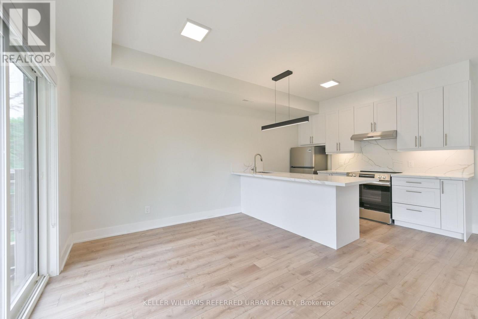2 - 2420 Gerrard Street E, Toronto, Ontario  M4E 2E9 - Photo 12 - E13756836