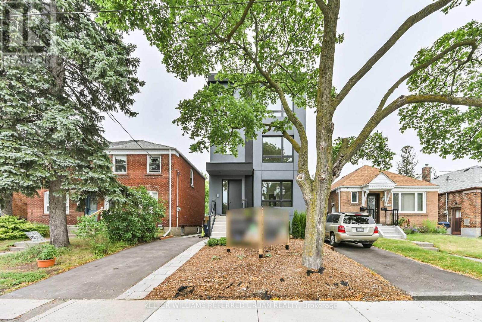 2 - 2420 Gerrard Street E, Toronto, Ontario  M4E 2E9 - Photo 2 - E13756836