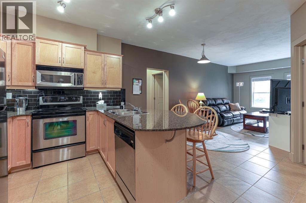 1305, 11811 Lake Fraser Drive SE, Calgary, Alberta  T2J 7J1 - Photo 3 - A2343204