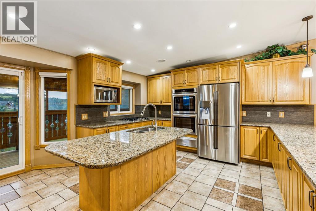 90 Glenhill Drive, Cochrane, Alberta  T4C 1H1 - Photo 12 - A2341736