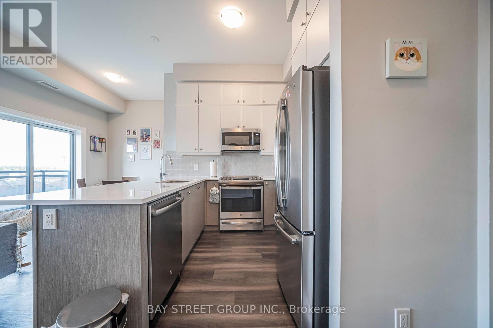 630 - 128 Grovewood Common, Oakville, Ontario  L6H 0X3 - Photo 9 - W13757902