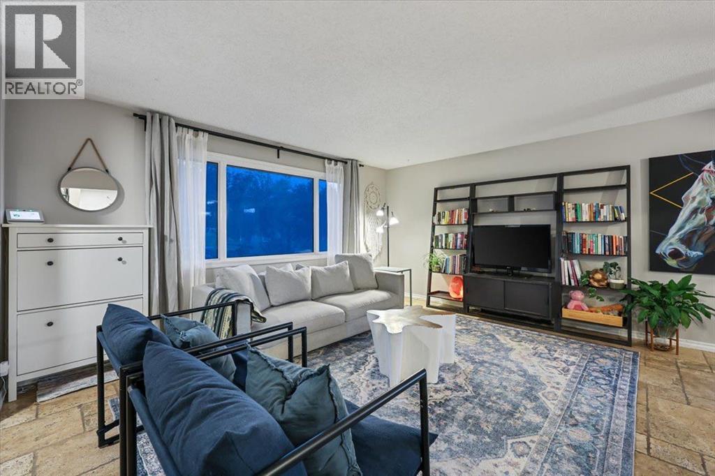 363 Queensland Drive SE, Calgary, Alberta  T2J 4G3 - Photo 5 - A2342719