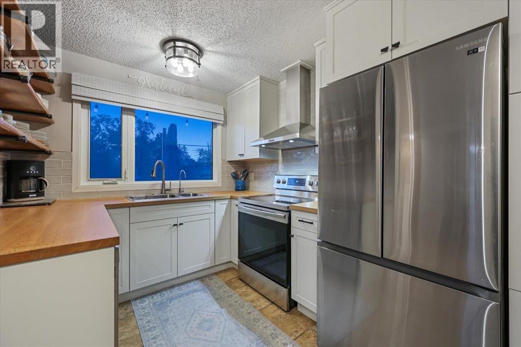 363 Queensland Drive SE, Calgary, Alberta  T2J 4G3 - Photo 16 - A2342719