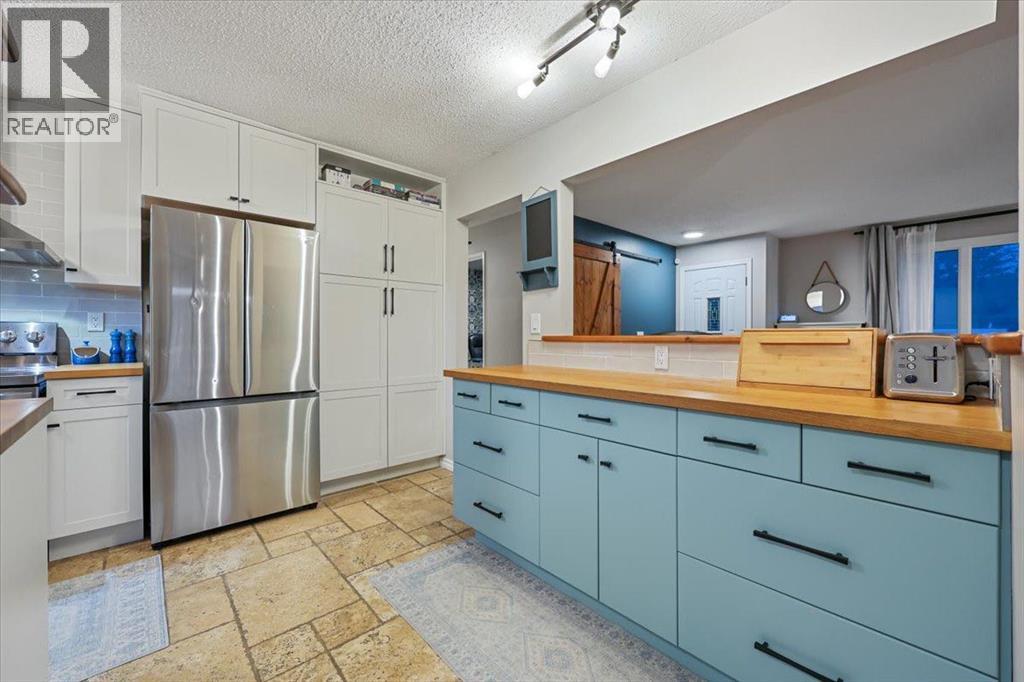 363 Queensland Drive SE, Calgary, Alberta  T2J 4G3 - Photo 14 - A2342719