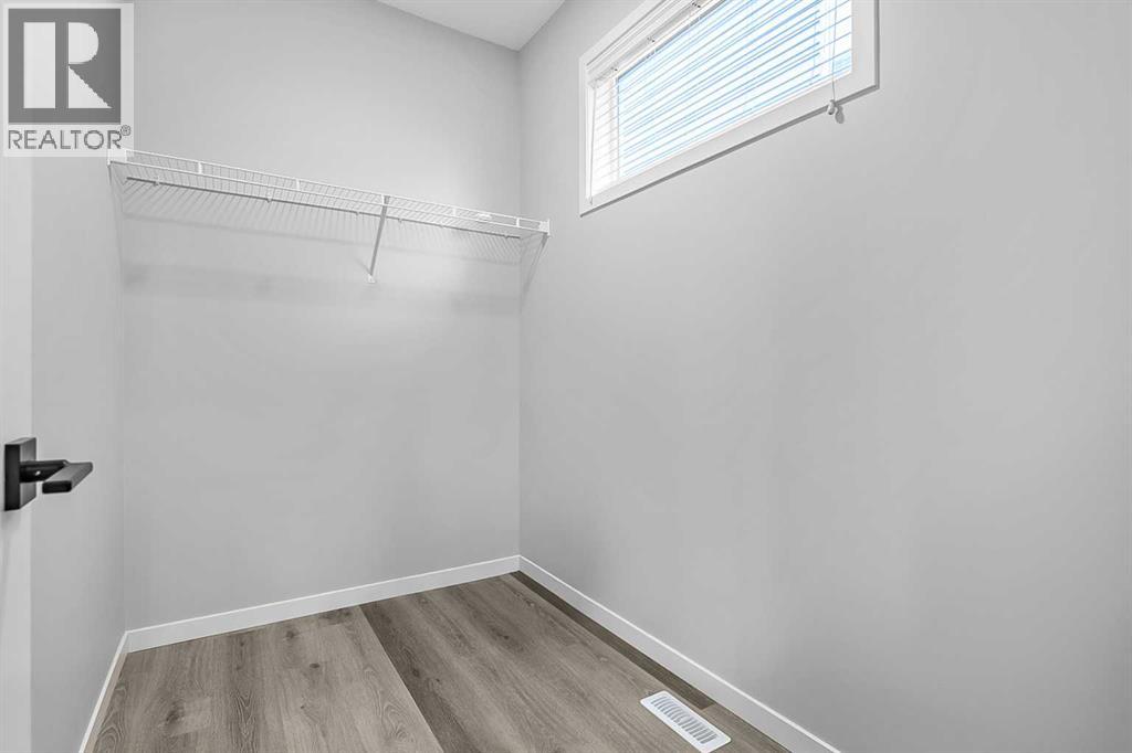 68 Wolf Gate, Okotoks, Alberta  T1S 5T9 - Photo 16 - A2329840