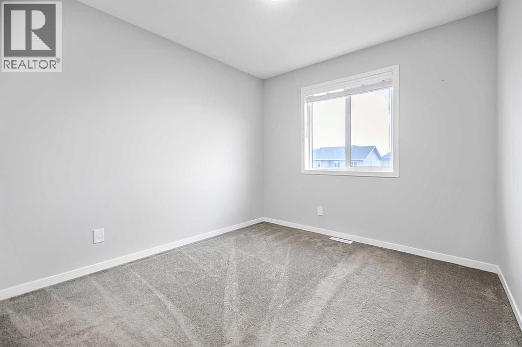 68 Wolf Gate, Okotoks, Alberta  T1S 5T9 - Photo 36 - A2329840