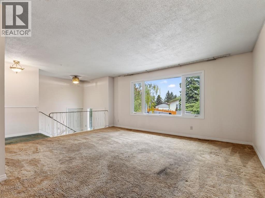 1219 Hunterquay Hill NW, Calgary, Alberta  T2K 4T3 - Photo 15 - A2342711