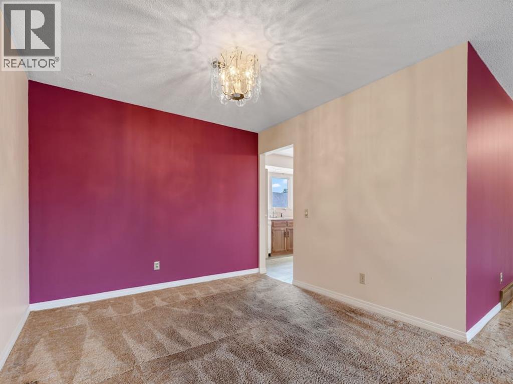 1219 Hunterquay Hill NW, Calgary, Alberta  T2K 4T3 - Photo 18 - A2342711