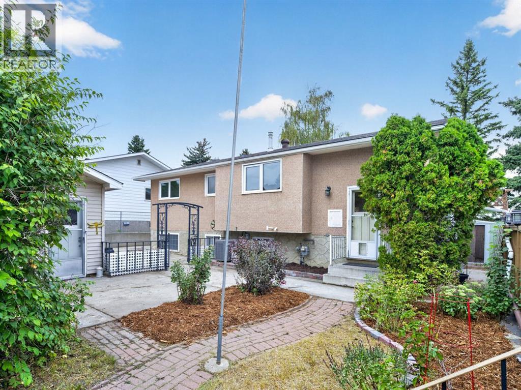 1219 Hunterquay Hill NW, Calgary, Alberta  T2K 4T3 - Photo 8 - A2342711