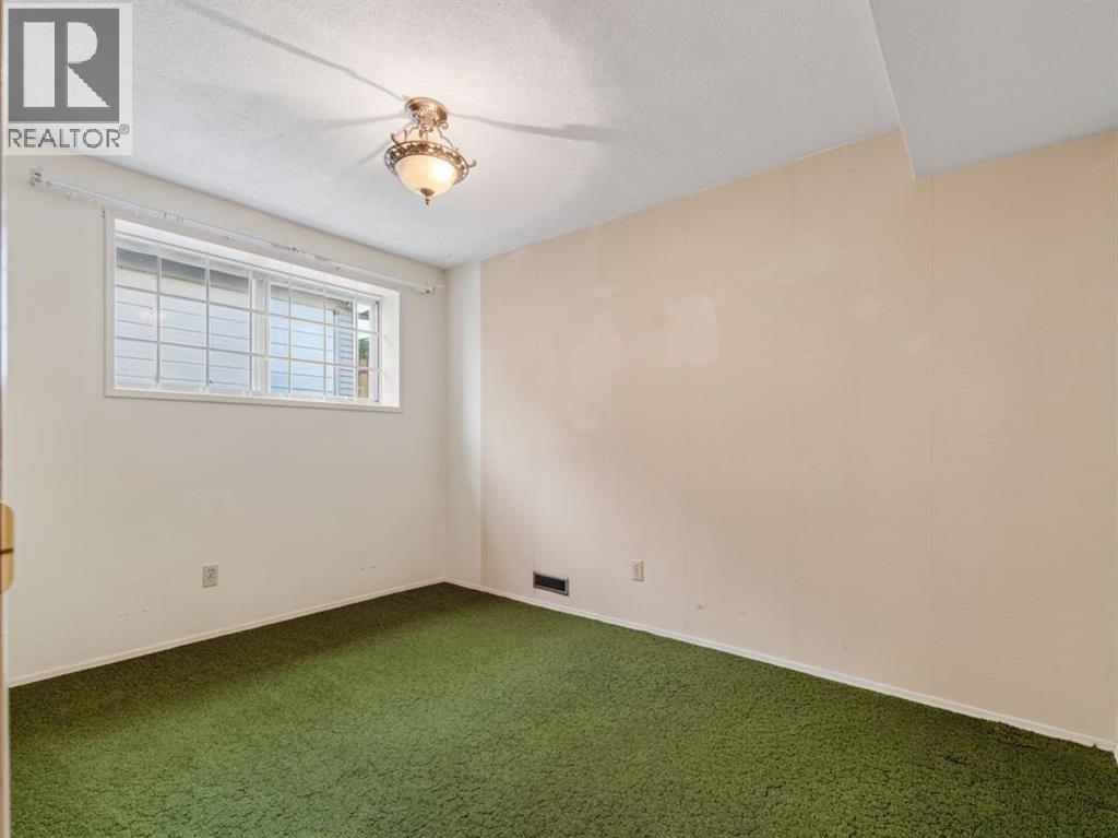 1219 Hunterquay Hill NW, Calgary, Alberta  T2K 4T3 - Photo 37 - A2342711