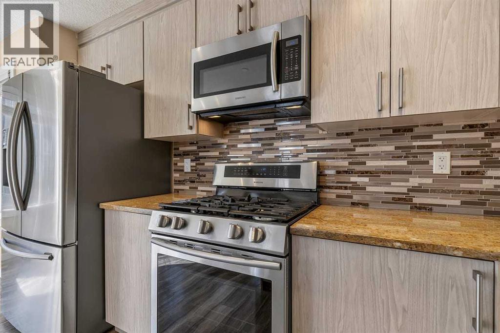60 Covecreek Mews NE, Calgary, Alberta  T3K 0V8 - Photo 9 - A2340571