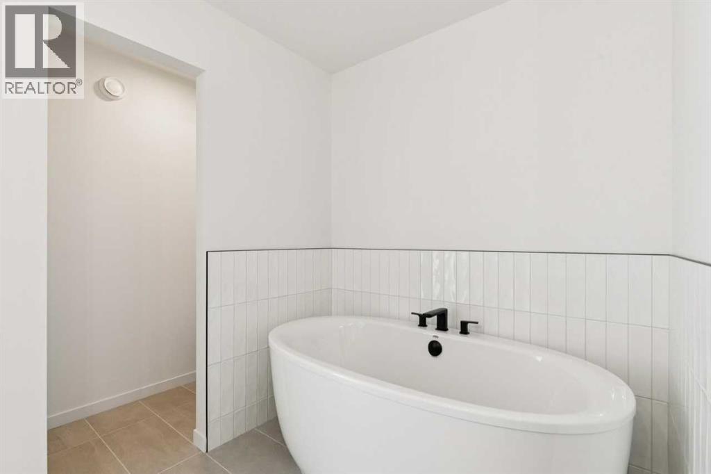 118 Creekstone Place SW, Calgary, Alberta  T2X 5M8 - Photo 38 - A2338632