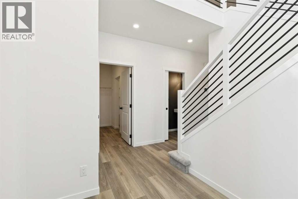 118 Creekstone Place SW, Calgary, Alberta  T2X 5M8 - Photo 3 - A2338632
