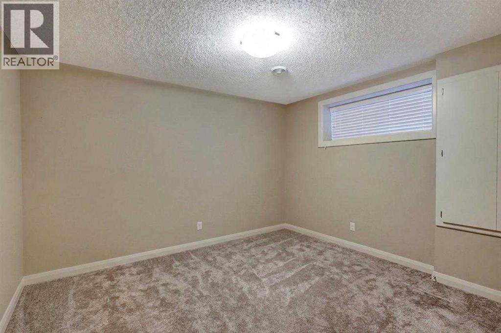 50 Evansfield Terrace NW, Calgary, Alberta  T3P 0K6 - Photo 29 - A2341528