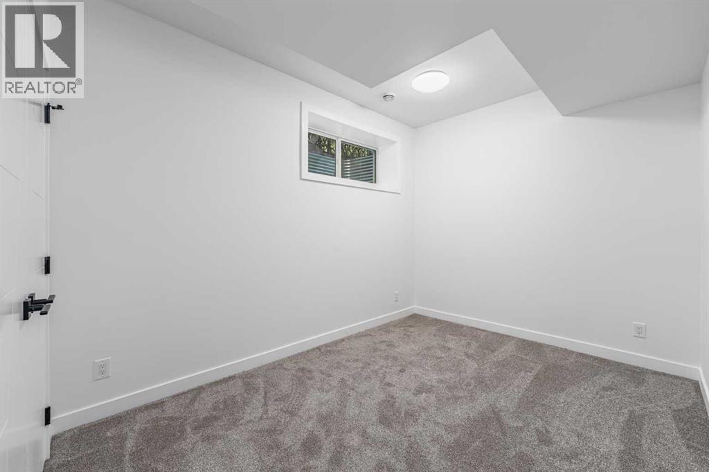 423 Hendon Drive NW, Calgary, Alberta  T2K 2A1 - Photo 37 - A2341823