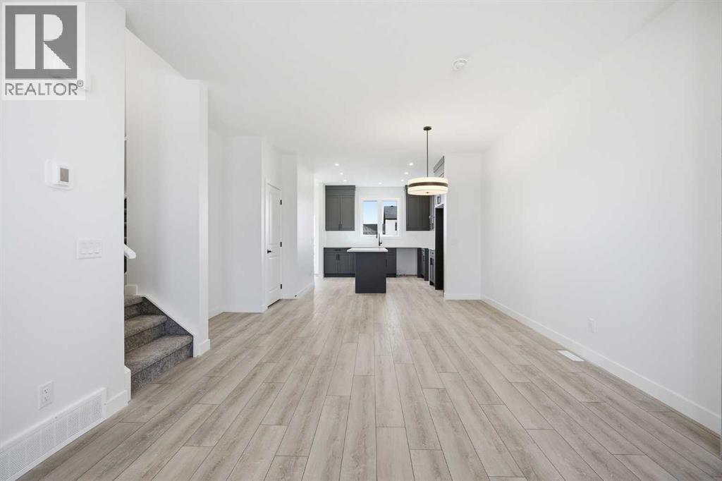 217 Bridgeport Gate, Chestermere, Alberta  T1X 3E2 - Photo 8 - A2337132